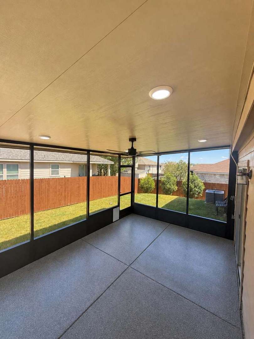 Long interior view down the length of the screen room