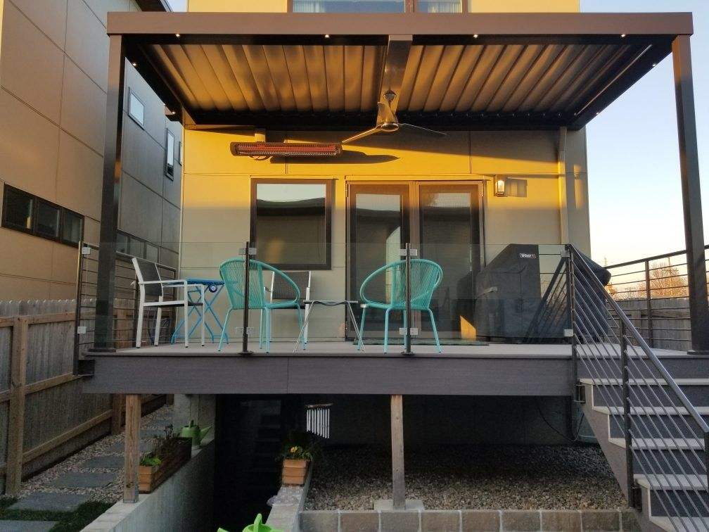 Elevated deck cover at sunset with cable railing